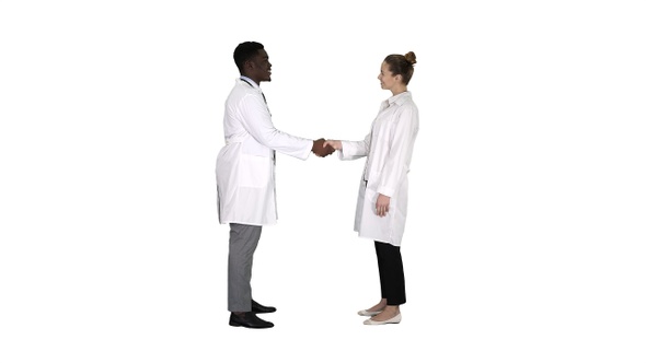 Nice to Meet You Doctors Meet and Shake Hands on White Background