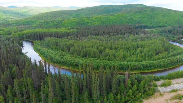 4K Drone Video (truck right shot) of Beautiful Horeshoe Bend in the Chena River as it runs through P