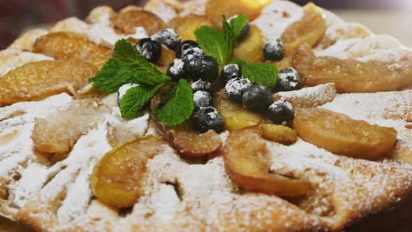 Rotating Apple Pie with Slices of Caramelized Apples