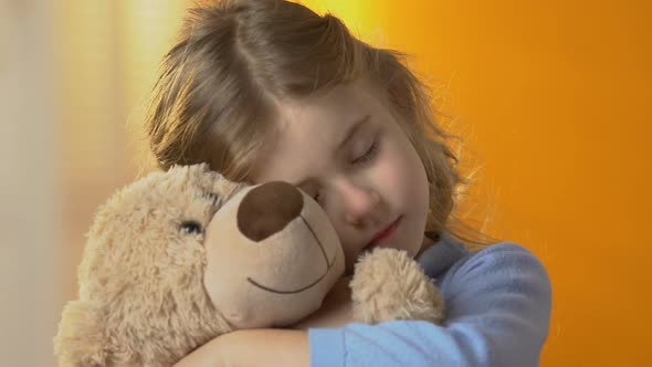 Little Abandoned Female Child Hugging Teddy Bear, Suffering Loneliness, Problems