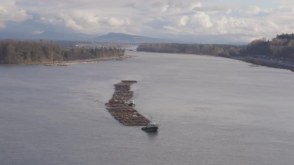 Logs Pulled By a Tugboat on Fraser River