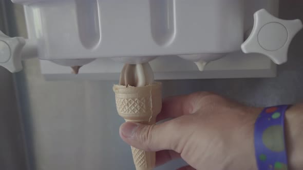 Ice Cream In Cone. Ice Cream In Waffle Cup Slow Motion. Filling Wafer Cup Ice Cream.