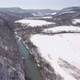 Aerial of Rolling Hills And River With Snow - VideoHive Item for Sale