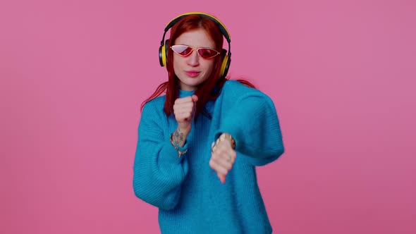 Cheerful Attractive Girl Listening Music Via Headphones and Dancing Disco Fooling Around Having Fun