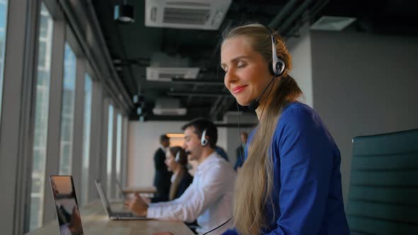 Young Lady Employee Happy of Conversation with Customer Calling By Headset