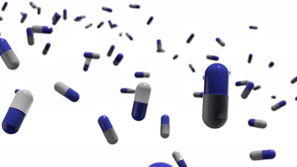 Many blue prescription drug trial medicine pill capsules in a pharmacology and virology research lab