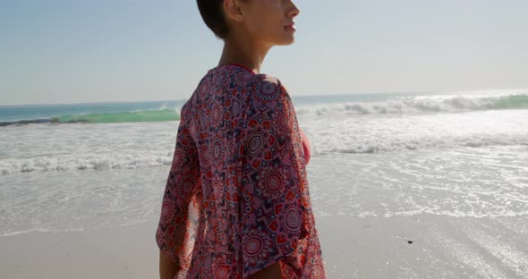 Young woman by the sea