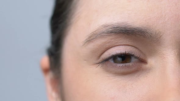 Young Woman Squinting Eyes, Trying to Focus to See More Clearly, Bad Vision