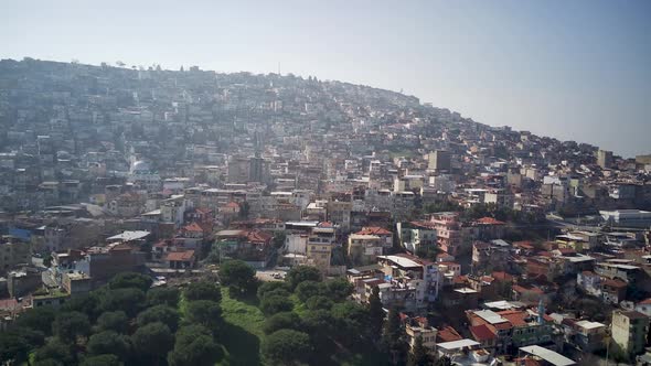 Drone view on poverty slum district and muslim mosque