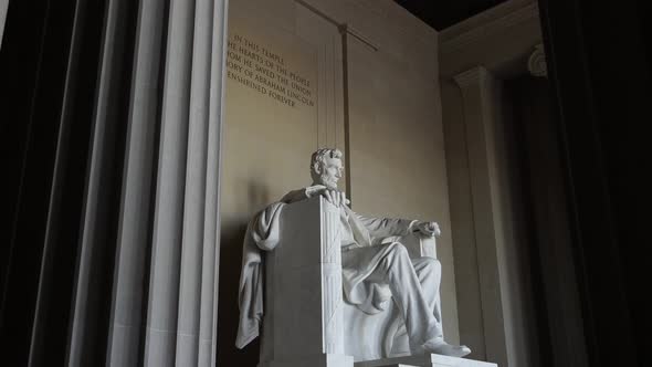 Tracking Shot towards the Abraham Lincoln Statue through the Lincoln Memorial Columns