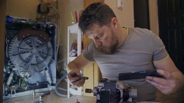 Young Housewife Does Not Know How to Fix His Broken Washing Machine