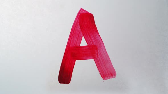 Painting alphabet on white paper, Slow Motion