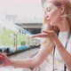 Slow motion young caucasian woman outdoor using smartphone videocalling - VideoHive Item for Sale