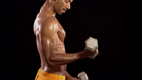 Athletic Man Lifting Weights