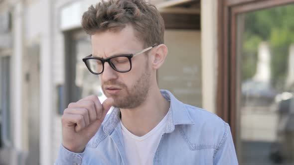 Coughing Sick Young Man Standing Outdoor