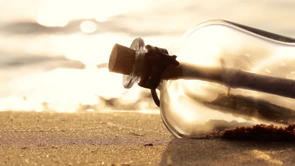 Message in the Bottle Against the Sun Setting Down