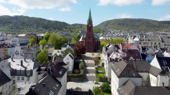 Aerial approaching the huge Johannes-Church in Bergen Norway - Old catholic church made of brick