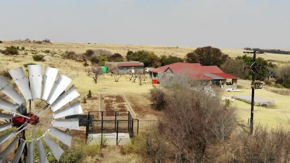 Fly-over footage of a South African farmhouse in winter