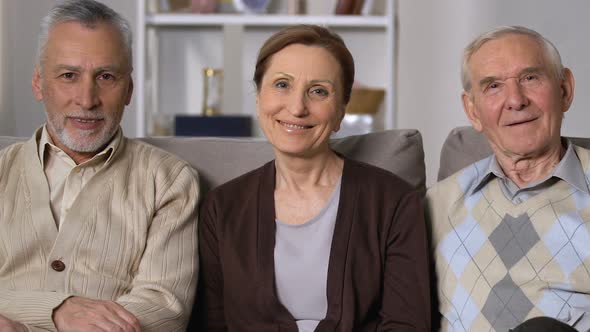 Healthy Senior People Smiling on Camera Sitting Sofa, Nursing Home, Good Mood