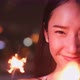 Young asian woman with sparklers is dancing and celebrating a new year. Fireworks, - VideoHive Item for Sale