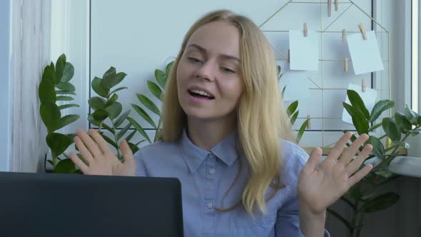 Young Woman Working on a Computer at Home