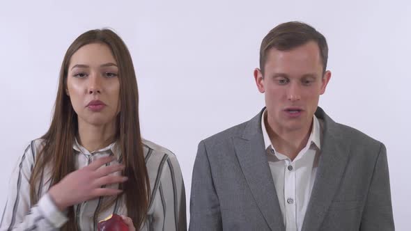 Portrait of Man and Woman Knead the Face Doing Different Facial Expressions Isolated