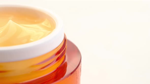 Beauty Cream in a Container on White Background