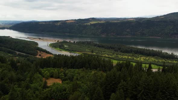 Aerial drone footage overlooking Oregon forests and Columbia River