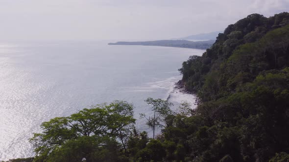 Aerial Drone View of Rainforest and Ocean on the Pacific Coast in Costa Rica, Tropical Jungle Coasta