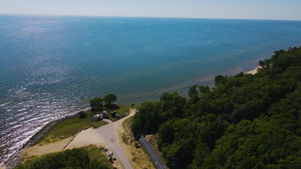 Chaotic drone fluctuation over a lake.