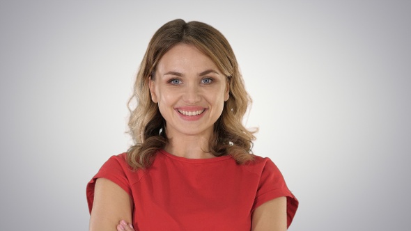 Young blond woman being serious and then smiling Changing