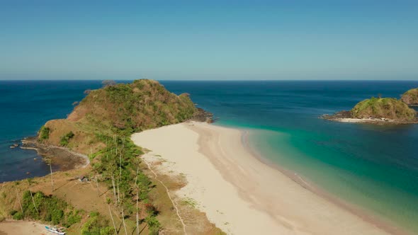 Wide Tropical Beach with White Sand View From Above