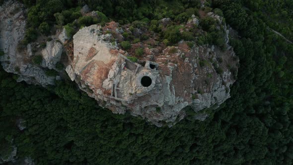 Aerial View of Crumbling Abandoned Stone Tower on the Top of Mountain