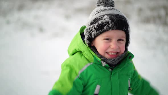 Very Happy Young Boy on Cold Winter Day