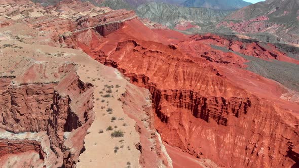 Flying Over Multicolored Mountains in Quebrada Colorado, Argentina, Salta