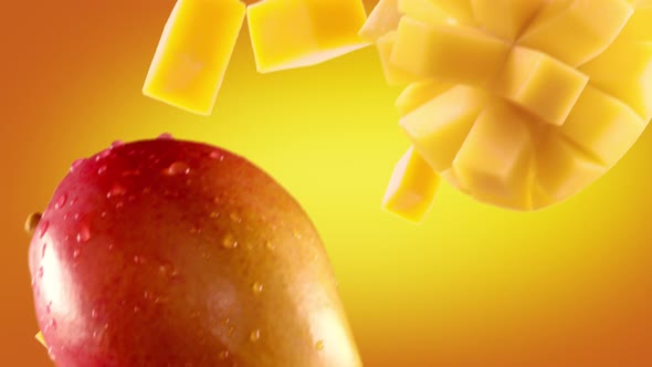 Mango with Slices Falling on Orange Background