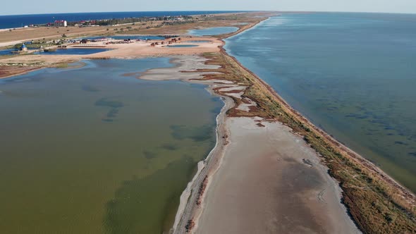 Beautiful flight in summer over salt lakes. Dry lakes. Green grass.