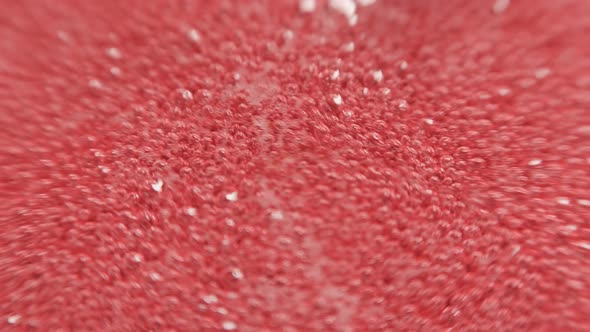Raspberry Syrup, Pink Background with Bubbling Bubbles and Raspberries