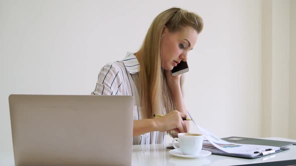 Blonde Business Woman Working at Modern Office