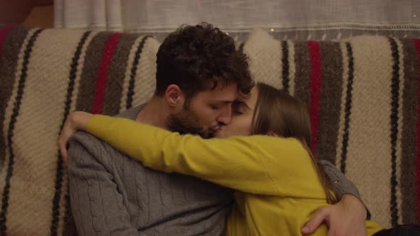 Close up of a young couple kissing