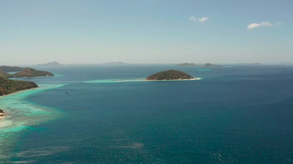 Small Torpic Island with a White Sandy Beach Top View