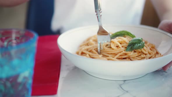 Woman Eating Pasta With Sauce Bolognese