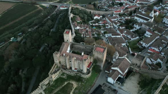 Panoramic View Of Obidos With Historic Walls And Castle In Leiria District, Portugal - aerial drone