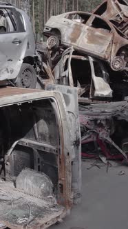 Vertical Video of a Dump of Destroyed Cars During the War in Ukraine