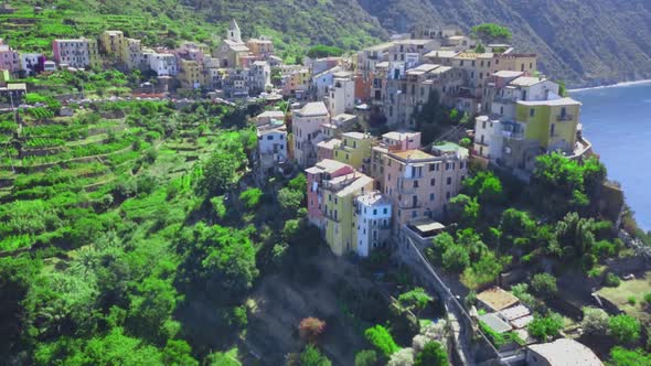 Flight by a drone of Corniglia village one of Cinque Terre coast of Italy in region of Liguria,Italy