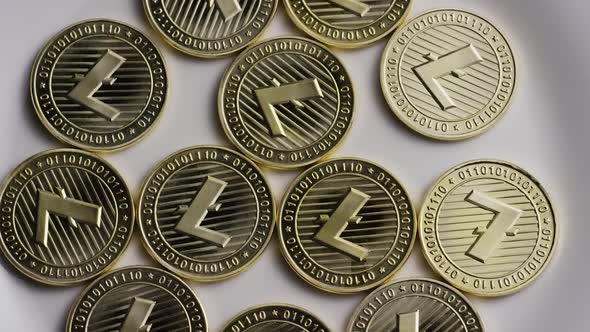 Rotating shot of Litecoin Bitcoins (digital cryptocurrency) - BITCOIN LITECOIN 0001