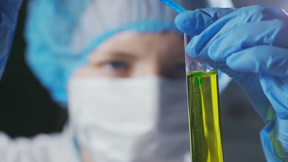 A Female Scientist Works in a Modern Laboratory