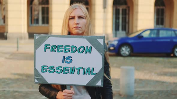 Woman on Protest Walk Calling That Freedom is Essential