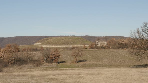 GAMZIGRAD, SERBIA - DECEMBER 25, 2017 Hills with burial and sacral complex  above Felix Romuliana pa