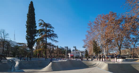 Tbilisi, Georgia - January 23 2022: Time lapse shot of Skate park in the center of Tbilisi, Deda ena